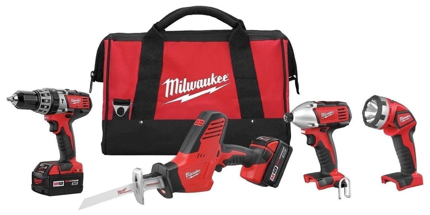 New Milwaukee 2695-24 M18 18 Volt 4 Tool Cordless Tool Set Drills & Saw Light